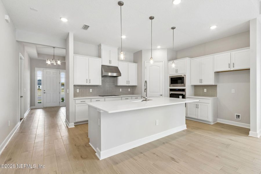 Furnished interior view inside a new home in Sandy Ridge, Yulee (Image 9).