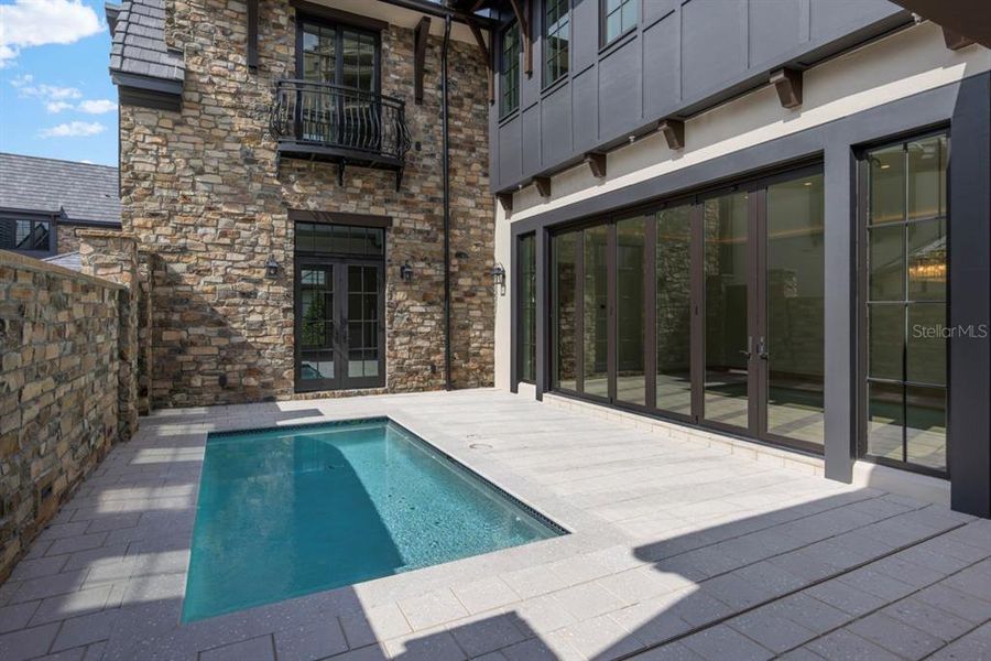 Exterior details and patio area of a home in , Orlando (Image 27).