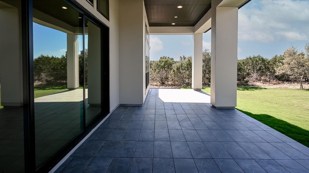 Exterior details and patio area of a home in The Preserve at Elm Creek, New Braunfels (Image 3).