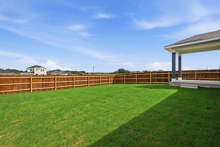Exterior details and patio area of a home in Watermill-Classic Collection, Uhland (Image 17).