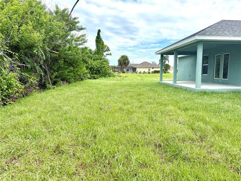 Front exterior of a new home in Rotonda, Rotonda West, FL, highlighting curb appeal (Image 12).