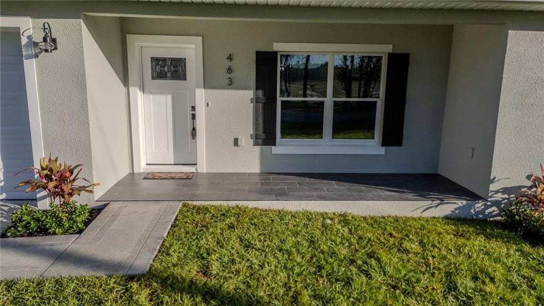 Exterior details and patio area of a home in , Deltona (Image 3).