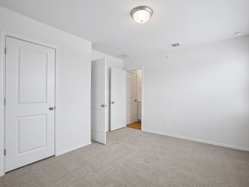 Spacious, unfurnished interior of a new home in Waterstone Village, Kyle (Image 12).