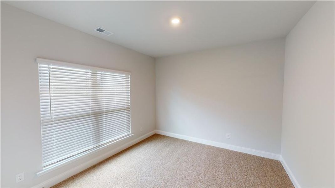 Spacious, unfurnished interior of a new home in Holliday Pass, Griffin (Image 19).