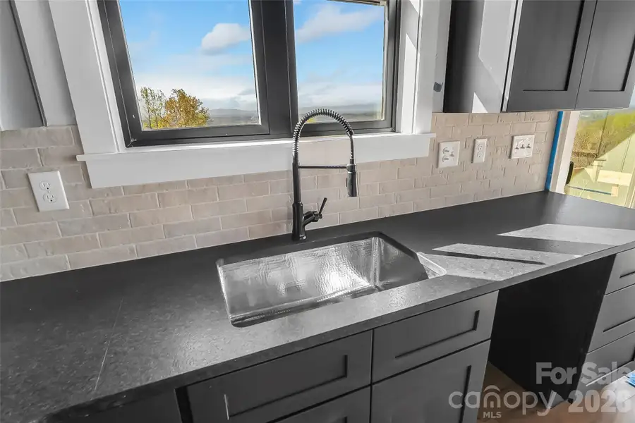 Kitchen sink with gorgeous mountain views Kitchen sink with gorgeous mountain views