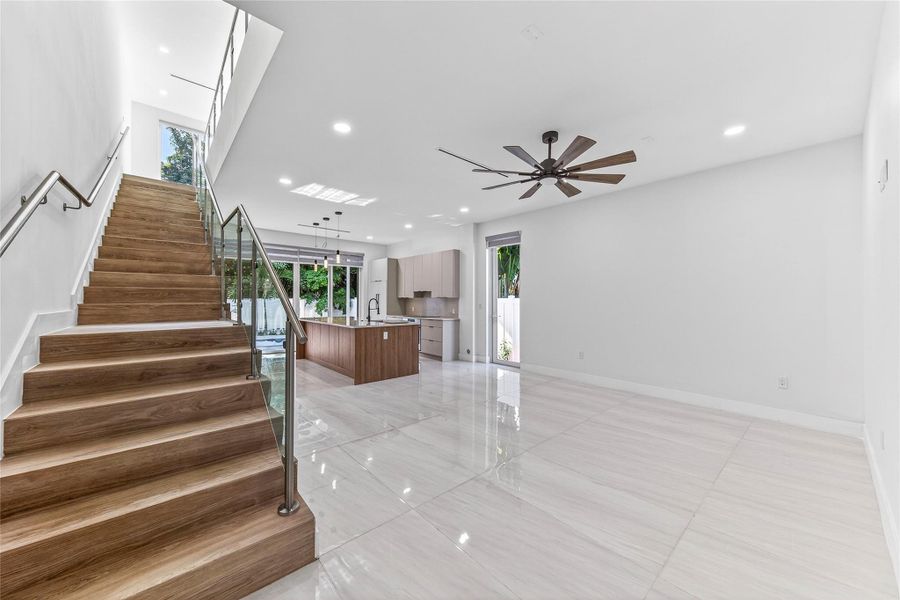 With view into dining and kitchen