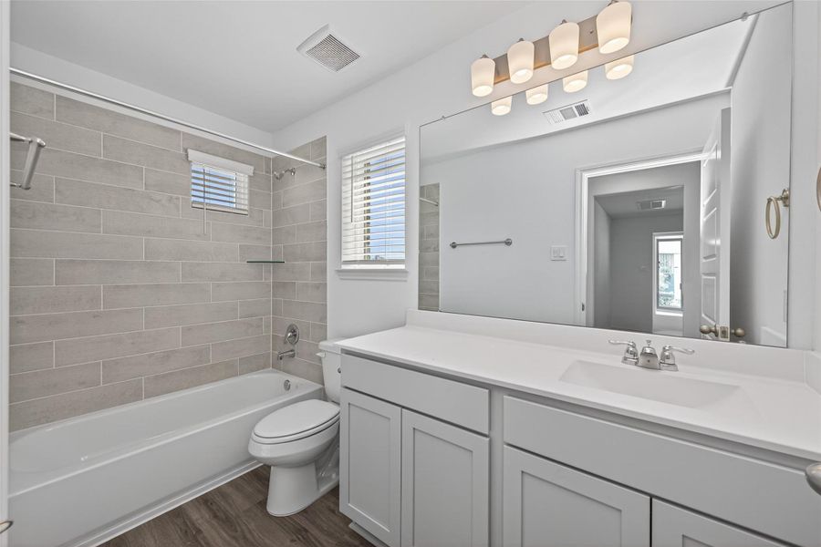 Furnished interior view inside a new home in Enclave at Willis, Willis (Image 10).
