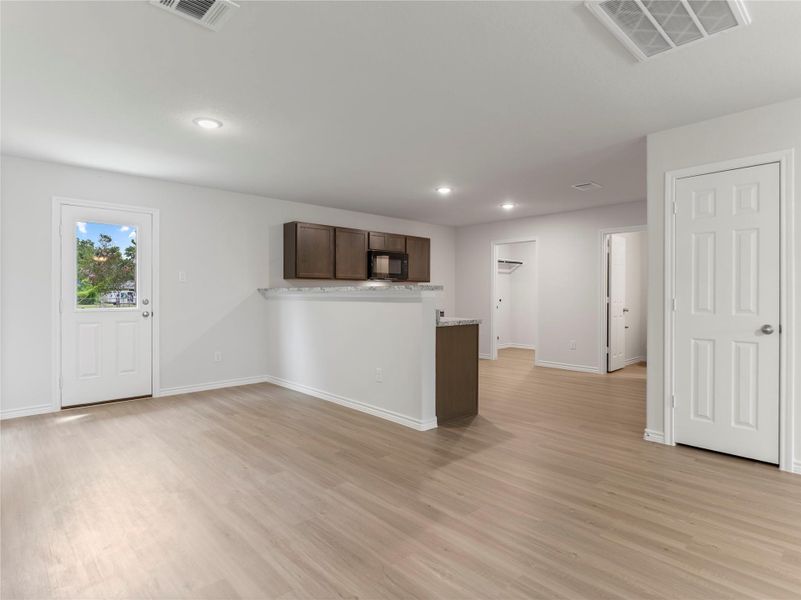 Open dining area seamlessly connected to the kitchen for effortless entertaining.
