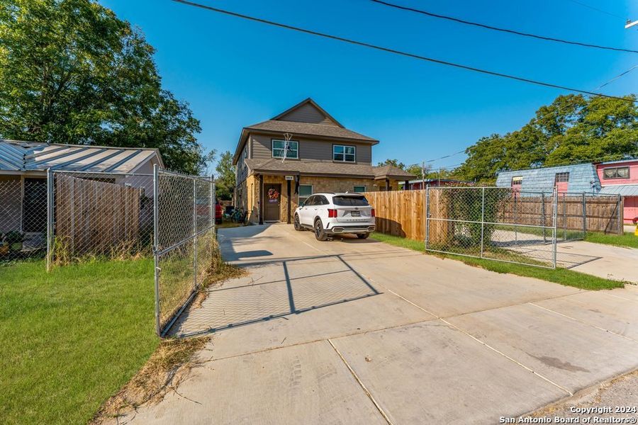Front exterior of a new home in , Natalia, TX, highlighting curb appeal (Image 19).