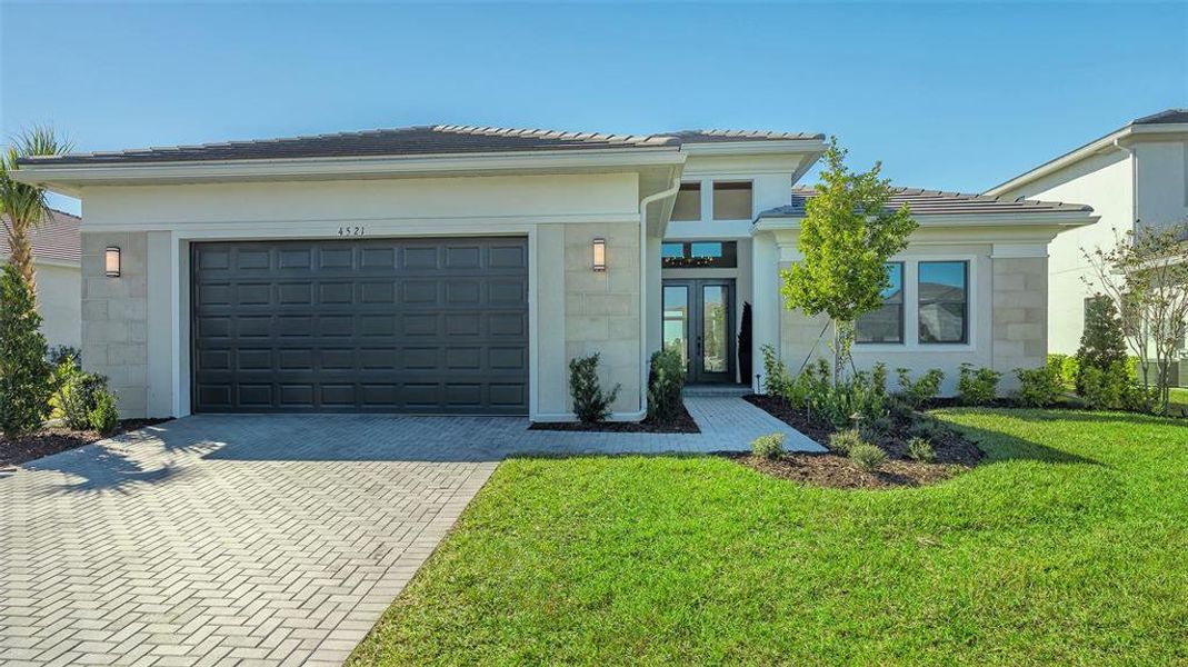 Front exterior of a new home in , Sarasota, FL, highlighting curb appeal (Image 29).