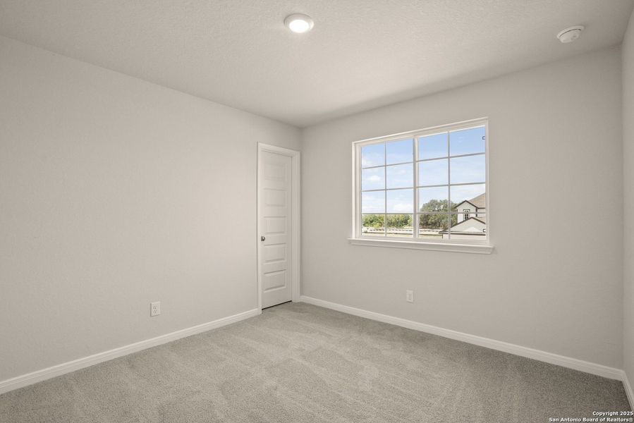 Spacious, unfurnished interior of a new home in Abbott Place, St. Hedwig (Image 24).