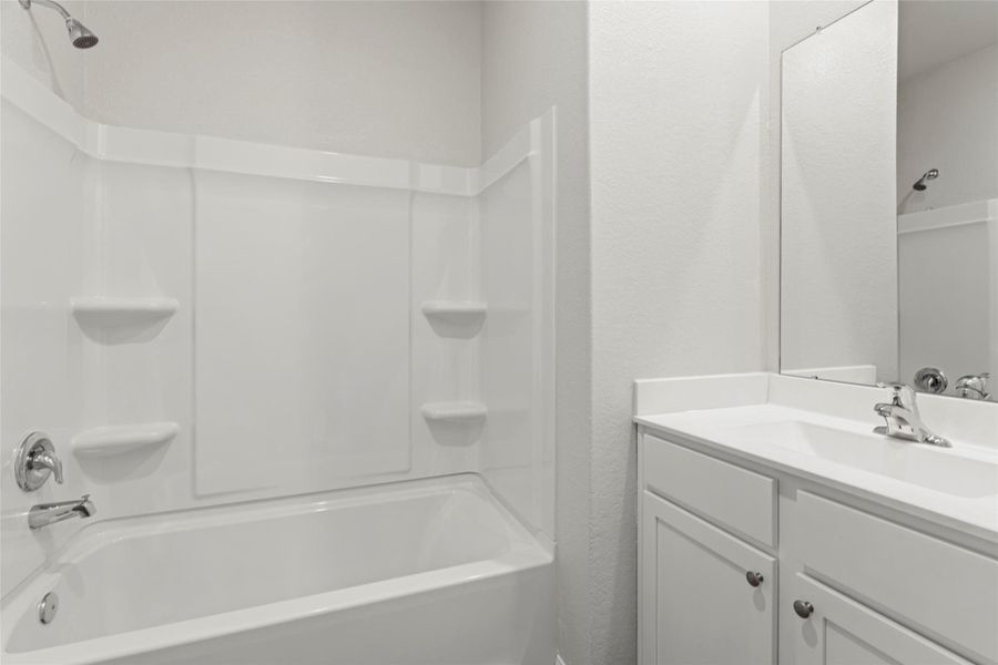 Furnished interior view inside a new home in Canterra Creek, Iowa Colony (Image 3).