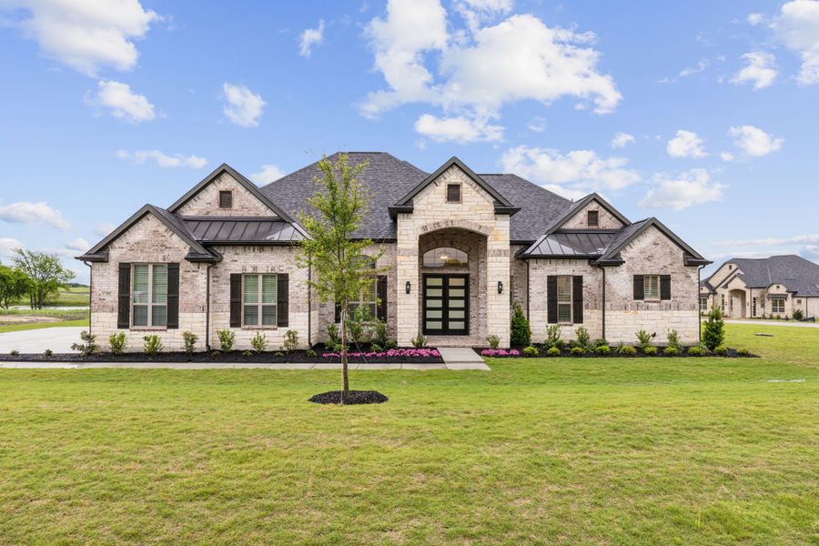 Representative exterior photo of a completed home built from the Alexandria by Chesmar Homes in Lakeway Estates, Waxahachie, TX (Image 10).