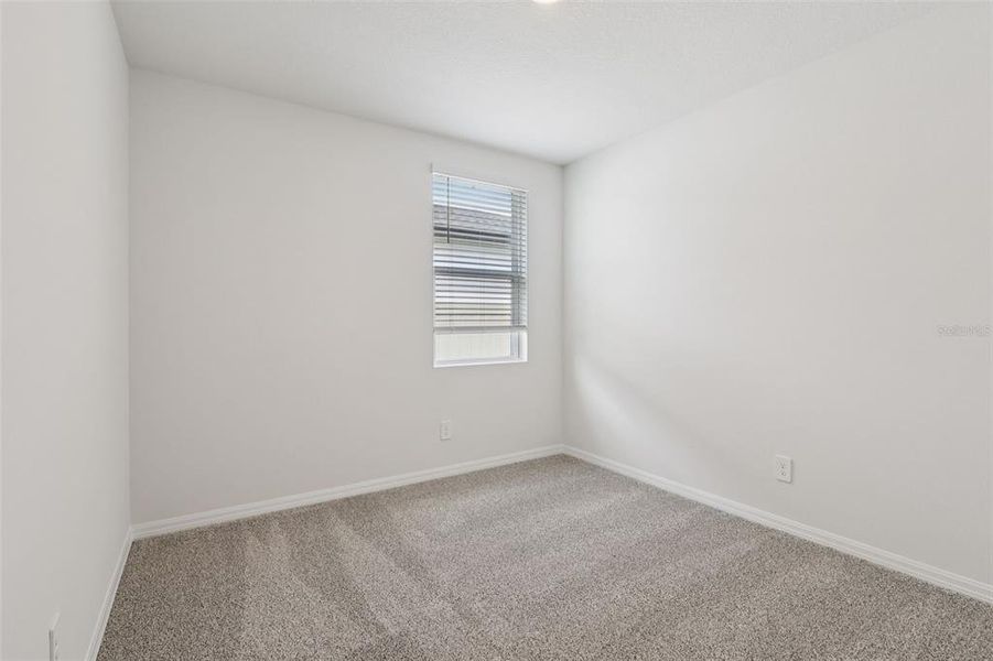 Spacious, unfurnished interior of a new home in Crosswinds - Signature Series, Haines City (Image 28).