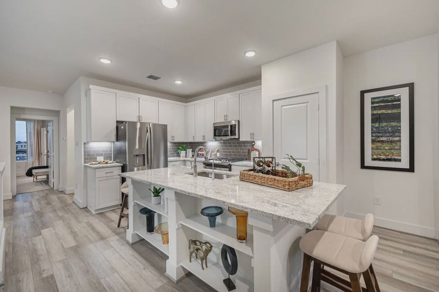 Representative furnished interior of a home built from the Calypso by Chesmar Homes in Prominence Urban, San Antonio (Image 5).