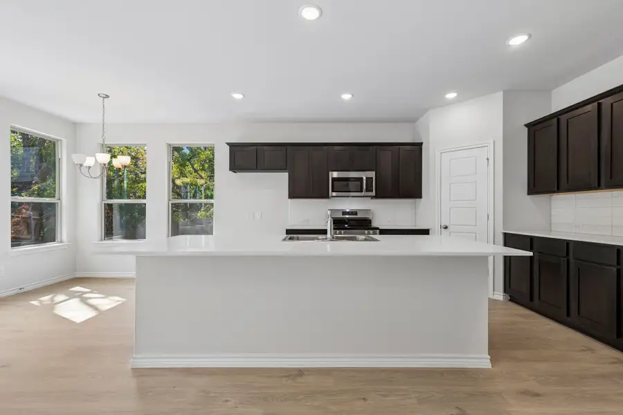 Furnished interior view inside a new home in Eagle Cove, Denton (Image 8).