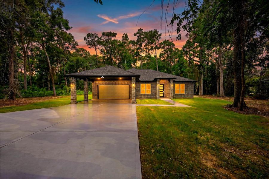 Exterior details and patio area of a home in , Splendora (Image 32).