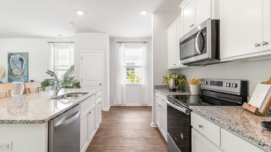 Furnished interior view inside a new home in Hillcrest, Ravenel (Image 3). Furnished interior view inside a new home in Hillcrest, Ravenel (Image 3).
