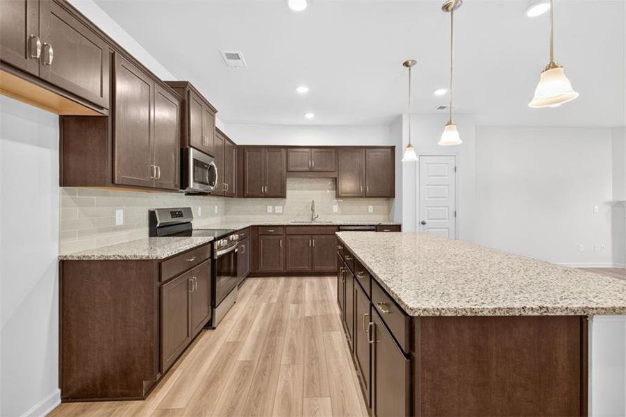 Furnished interior view inside a new home in Jameson Towns, Villa Rica (Image 5).