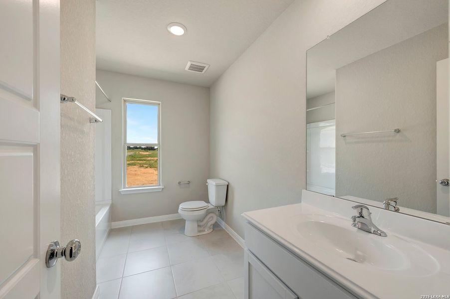 Furnished interior view inside a new home in Hickory Ridge Estates, Elmendorf (Image 10).