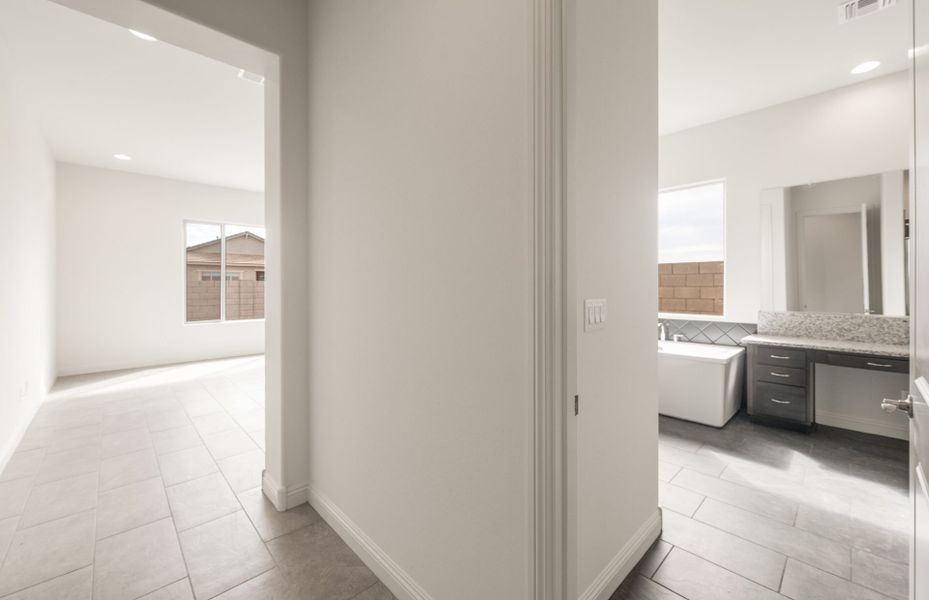Spacious, unfurnished interior of a new home in Artisan at Asante, Surprise (Image 22).