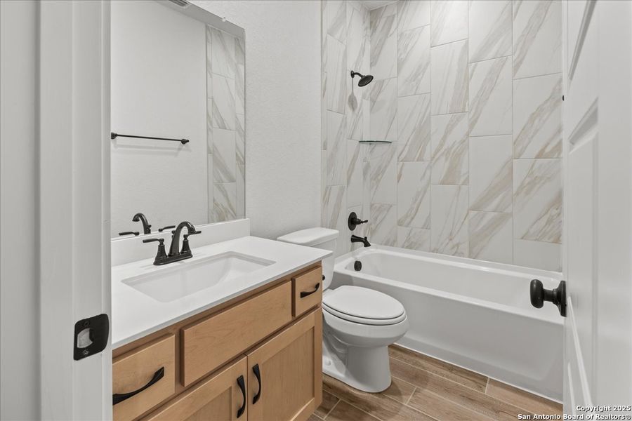 Furnished interior view inside a new home in Stream Waters, Seguin (Image 8).