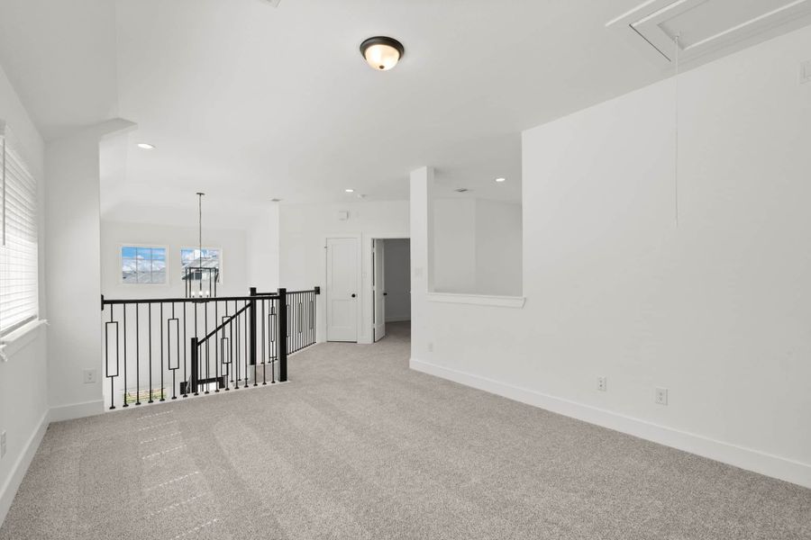 Representative unfurnished interior of a home built from the Dublin by Chesmar Homes in Sunterra, Katy (Image 10).