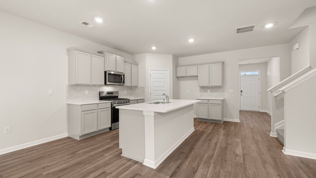 Furnished interior view inside a new home in Preserve at Dove Creek, Statham (Image 5).