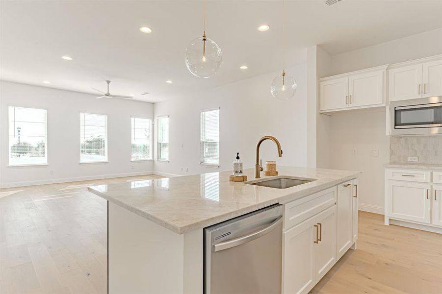 This building has not begun and will be built in a similar, but not exact manner to these photos of a home with the same floorplan. Actual finishes may differ. This building has not begun and will be built in a similar, but not exact manner to these photos of a home with the same floorplan. Actual finishes may differ.