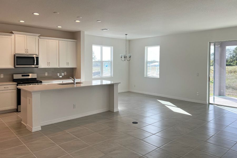 Furnished interior view inside a new home in Eagletail Landings, Howey-in-the-Hills (Image 4). Furnished interior view inside a new home in Eagletail Landings, Howey-in-the-Hills (Image 4).