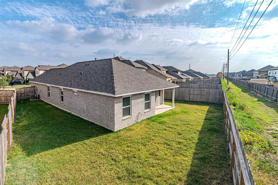 Exterior details and patio area of a home in Marvida, Cypress (Image 28).