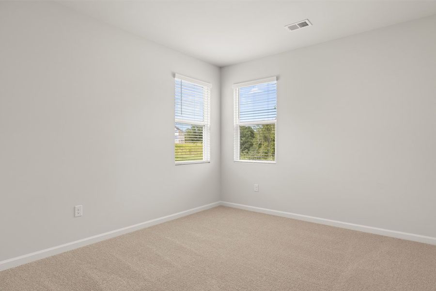 Representative unfurnished interior of a home built from the Mansfield by D.R. Horton in Southwind Village, Evans (Image 24).