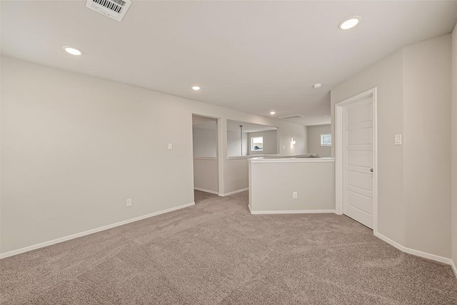 Spacious, unfurnished interior of a new home in Sunterra, Katy (Image 42).