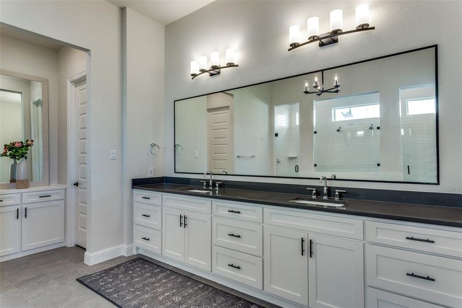 Full bath with double vanity and a walk in shower Full bath with double vanity and a walk in shower