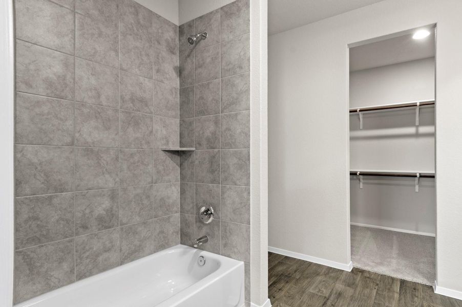 Furnished interior view inside a new home in Oaks at San Gabriel, Georgetown (Image 9).