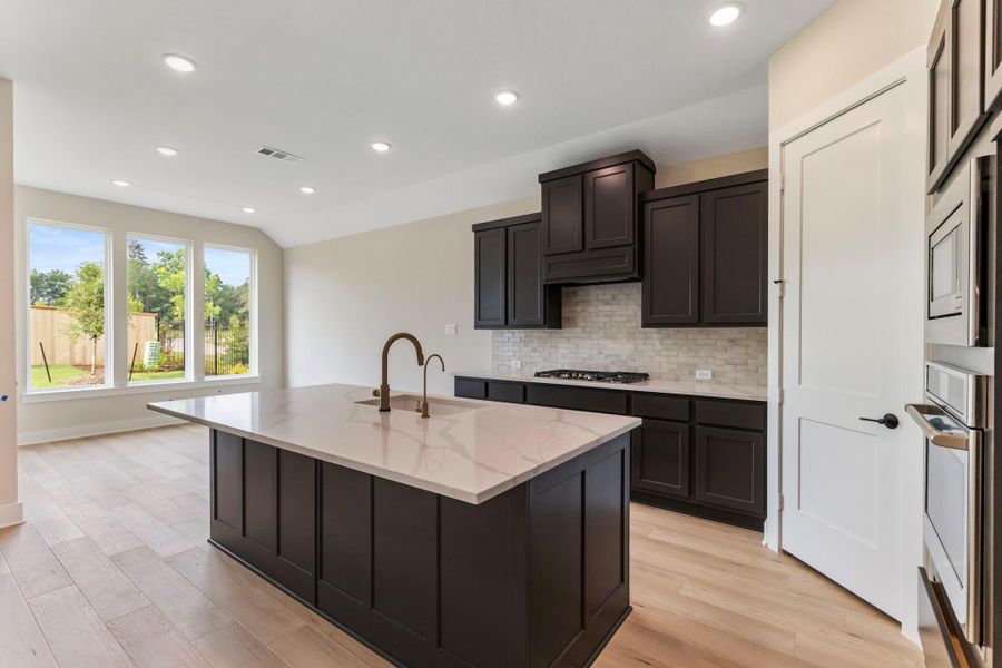 Furnished interior view inside a new home in , The Woodlands (Image 12).
