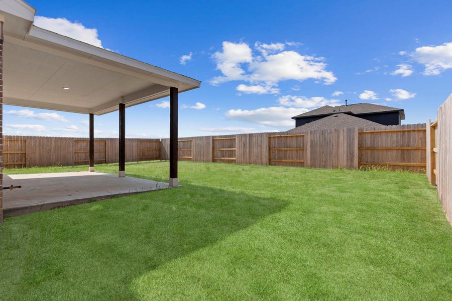 Step outside to your large, covered patio—perfect for entertaining, grilling, or relaxing in the shade while enjoying the privacy of your fully fenced backyard. There’s plenty of room for gatherings or play! Step outside to your large, covered patio—perfect for entertaining, grilling, or relaxing in the shade while enjoying the privacy of your fully fenced backyard. There’s plenty of room for gatherings or play!