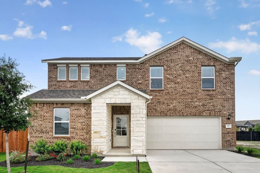 Representative exterior photo of a completed home built from the Oriole by Taylor Morrison in Emory Crossing, Hutto, TX (Image 14). Representative exterior photo of a completed home built from the Oriole by Taylor Morrison in Emory Crossing, Hutto, TX (Image 14).
