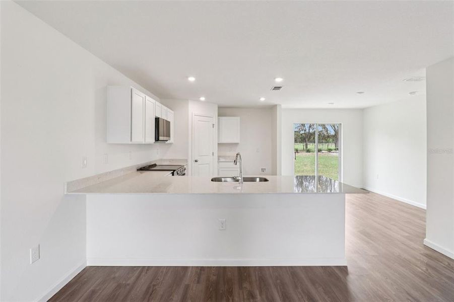 Furnished interior view inside a new home in Sumter Villas, Sumterville (Image 8).