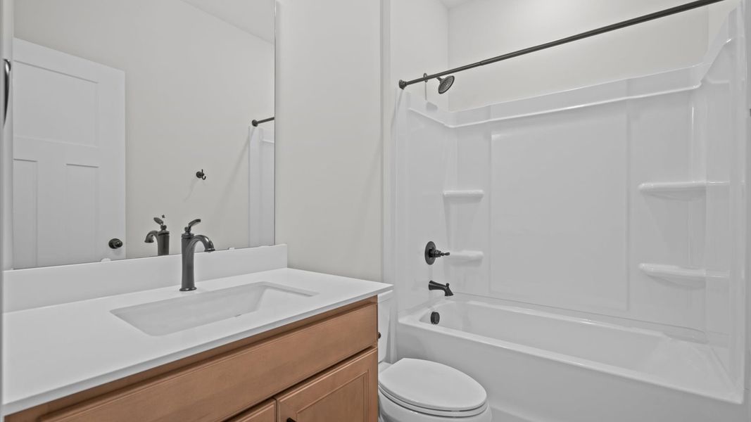 Well-appointed full bath with high standards of craftsmanship and everyday function