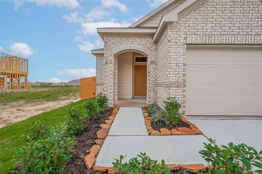 Exterior details and patio area of a home in Enclave at Willis, Willis (Image 3). Exterior details and patio area of a home in Enclave at Willis, Willis (Image 3).
