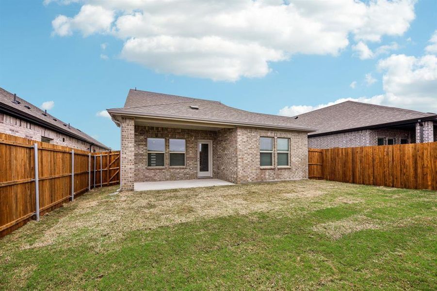 Exterior details and patio area of a home in Parks at Foster Crossing - Spring Series, Anna (Image 4).