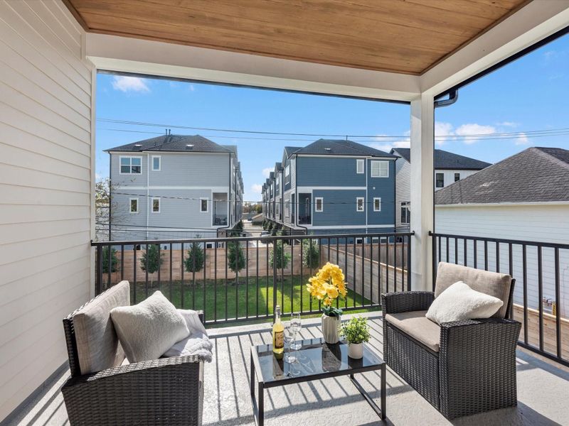 The primary also boasts this cute balcony - ideal for your morning cup of coffee.