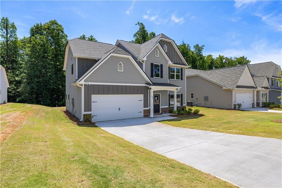 Front exterior of a new home in , Villa Rica, GA, highlighting curb appeal (Image 20).