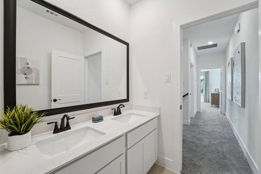 Furnished interior view inside a new home in Bridgeland, Cypress (Image 17).