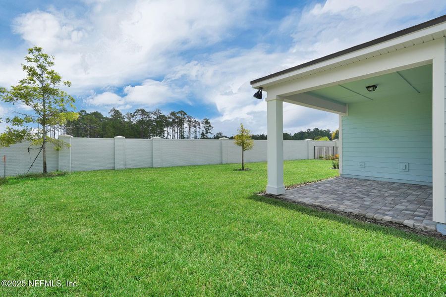 Exterior details and patio area of a home in Summer Bay at Grand Oaks, St. Augustine (Image 4). Exterior details and patio area of a home in Summer Bay at Grand Oaks, St. Augustine (Image 4).