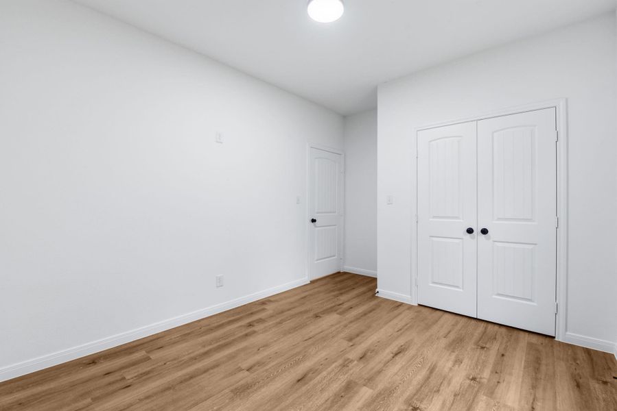 Second bedroom with double doors closet