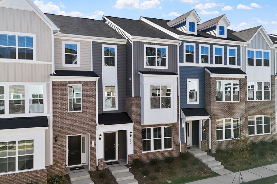Front exterior of a new home in Renaissance at White Oak, Garner, NC, highlighting curb appeal (Image 1). Front exterior of a new home in Renaissance at White Oak, Garner, NC, highlighting curb appeal (Image 1).