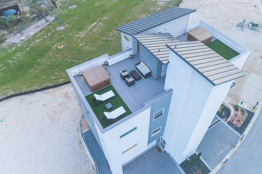 ROOFTOP PIC OF BUILDING 3 FROM PHASE 1.  EACH CONDO HAS IT'S OWN ROOFTOP PATIO.