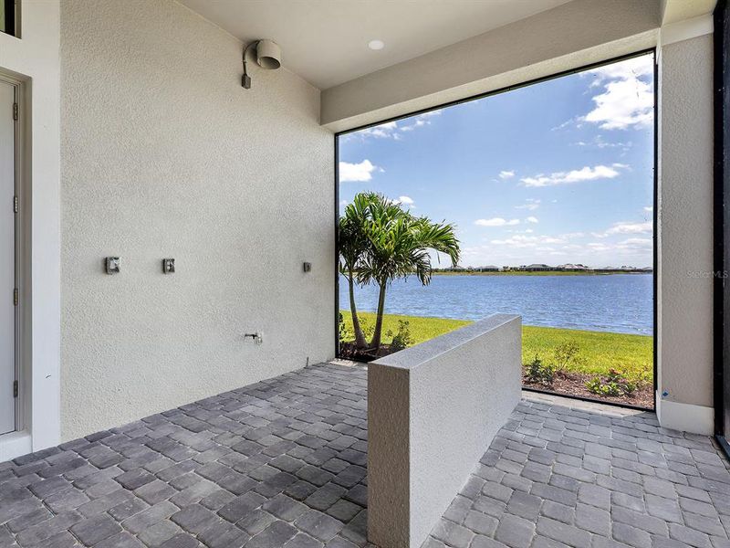Exterior details and patio area of a home in , Sarasota (Image 42).